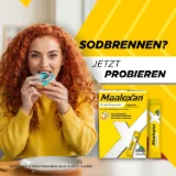 Person isst ein Gebäck; daneben Maaloxan® Suspension – Sachets – Minze mit der Aufschrift „Sodbrennen? Jetzt probieren.“